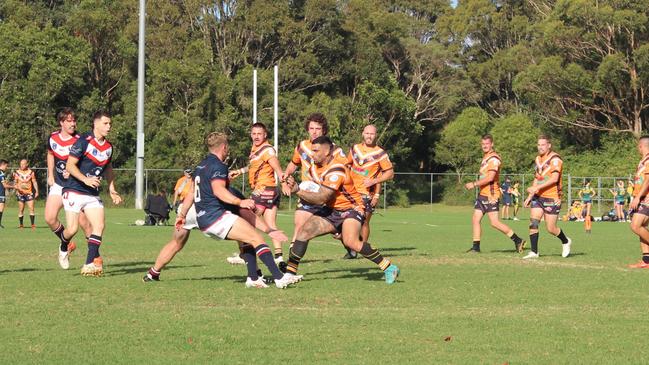 The Entrance Tigers' centre Dominic Ayoub takes a hit-up. Photo: Alex Pichaloff.