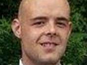 Tom Jackson (bald centre) is in critical condition in hospital after trying to save the life of Mia Ayliffe-Chung who was dragged from her bed and stabbed to death in a hostel bathroom in Home hill