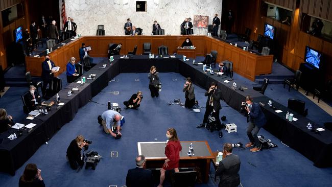 Supreme Court nominee Amy Coney Barrett departs following the second day of her confirmation hearing. Picture; AFP.