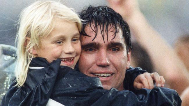 Erin Phillips with dad Greg Phillips after match the 1992 SANFL grand final between Glenelg and Port Adelaide. Picture: Neon Martin