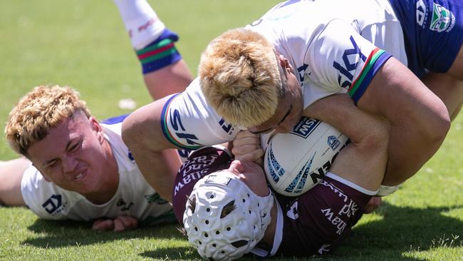 Boston Byrne is tackled by Tyson Hansen Picture: Julian Andrews