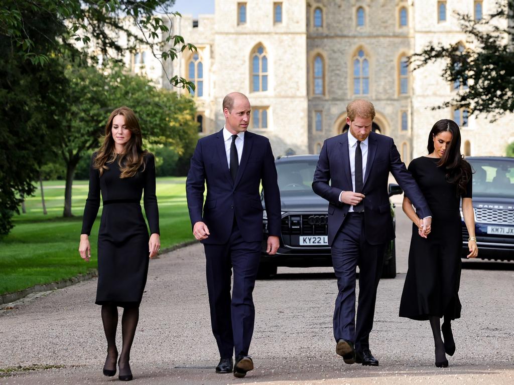 WINDSOR, ENGLAND - SEPTEMBER 10: Catherine, Princess of Wales, Prince William, Prince of Wales, Prince Harry, Duke of Sussex, and Meghan, Duchess of Sussex on the long Walk at Windsor Castle on September 10, 2022 in Windsor, England. Crowds have gathered and tributes left at the gates of Windsor Castle to Queen Elizabeth II, who died at Balmoral Castle on 8 September, 2022. (Photo by Chris Jackson - WPA Pool/Getty Images)