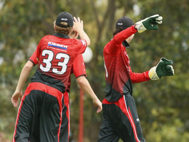 Lachlan Barber (No.33) and keeper Jack Mannix for the Bears. Photographer: Warren Gannon Photography