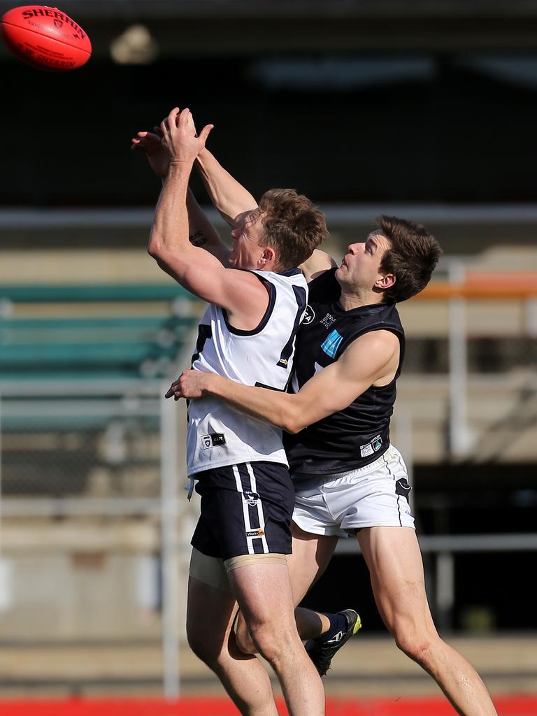 Vic Country’s Kayne Pettifer and VAFA’s Conor Ross at Ikon Park, Carlton. Picture: Yuri Kouzmin