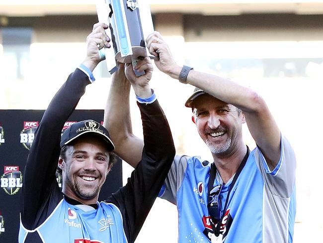 CRICKET - BBL FINAL - Adelaide Strikers v Hobart Hurricanes at The Adelaide Oval. Travis Head and Jason Gillespie with the trophy after the Strikers win. Picture Sarah Reed