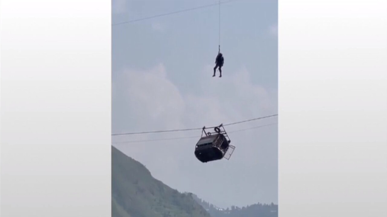 Eight people pulled to safety from broken cable car