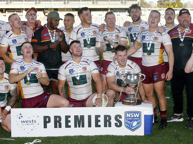 Thirlmere celebrate their Premiership. A Grade  Grand Final. Camden Rams (red and blue ) v Thirlmere Roosters (maroon and white). Macarthur Rugby League Grand Final Day. Picture: John Appleyard