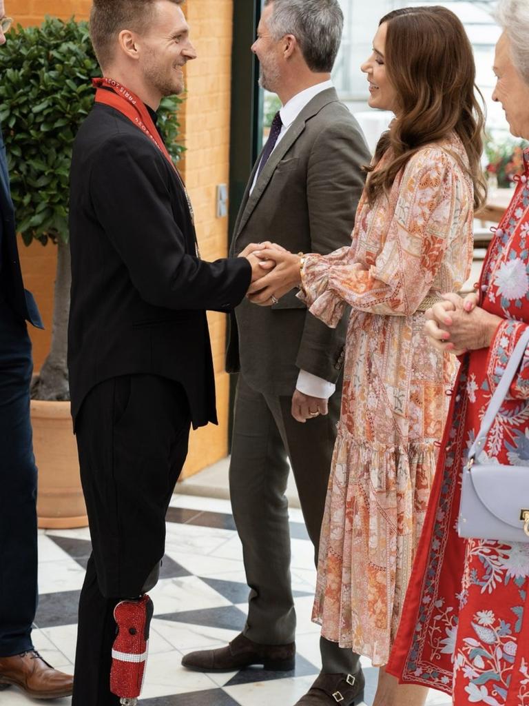 The Aussie-born monarch beamed as she greeted guests at Fredensborg Palace including Paralympic athlete Daniel Wagner d. Picture: @detdanskekongehus/Instagram