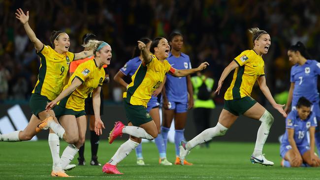 Matildas players celebrate winning the FIFA Womens World Cup Quarter final match against France in Brisbane. Picture: Lachie Millard