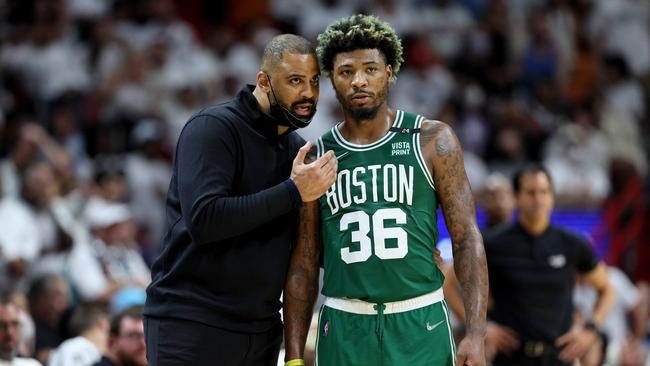 Head Coach Ime Udoka of the Boston Celtics talks with Marcus Smart #36 against the Miami Heat during the third quarter in Game Seven of the 2022 NBA Playoffs Eastern Conference Finals.