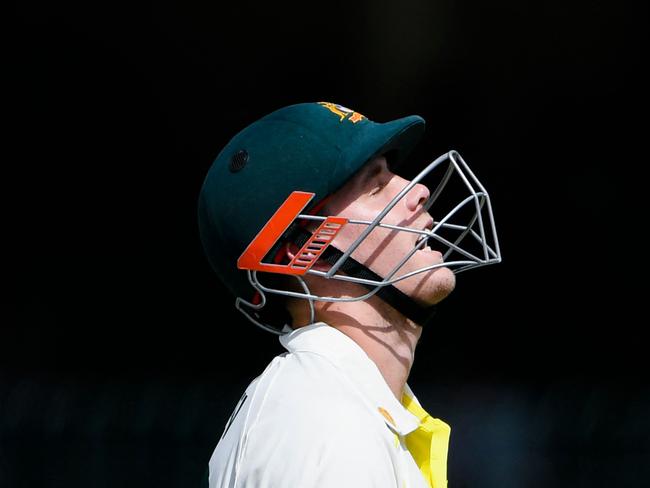 Australia's Cameron Green reacts after being bowled out during the second day of the third cricket Test match between Pakistan and Australia at the Gaddafi Cricket Stadium in Lahore on March 22, 2022. (Photo by Aamir QURESHI / AFP)