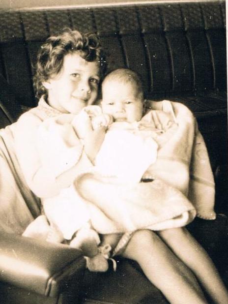 Anita Cobby with her sister Kathryn in her arms.