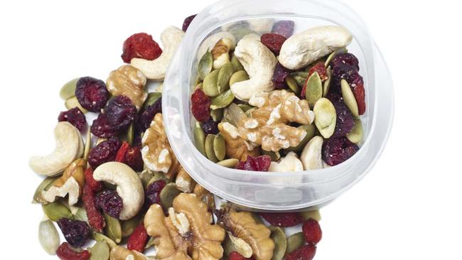 Paleo diet for Feeling Great: Trail mix container on white Picture: Supplied