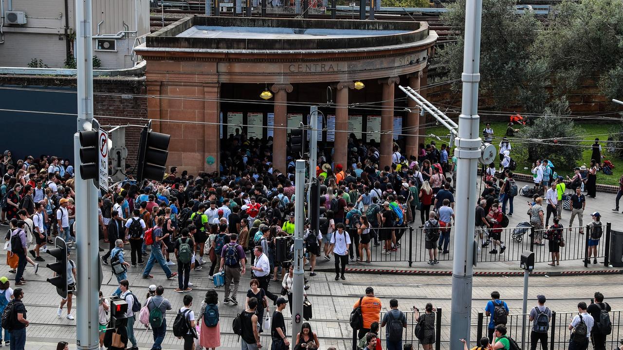 Queues of travellers stretching outside Central Station after the entire network ground to a halt earlier on Wednesday. Picture: Roni Bintang