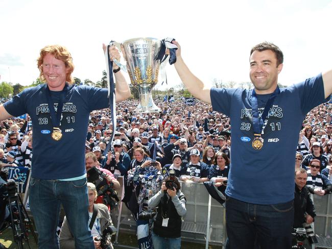 Cameron Ling and Chris Scott lifted the cup in 2011.