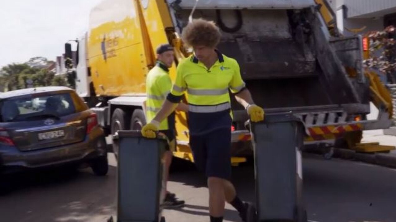 The former footy player makes end meet as a garbage man.