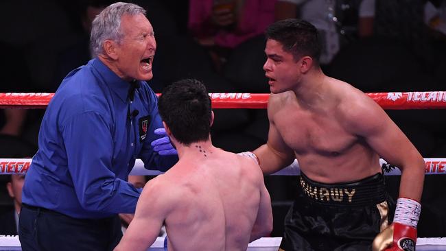 John Ryder (C) and Bilal Akkawy (R) react as referee Jay Nady calls the fight for Ryder. Picture: Ethan Miller/Getty Images