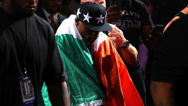 Floyd Mayweather has already tried goading Conor McGregor by draping himself in the Irish flag. (Photo by Mike Lawrie/Getty Images)