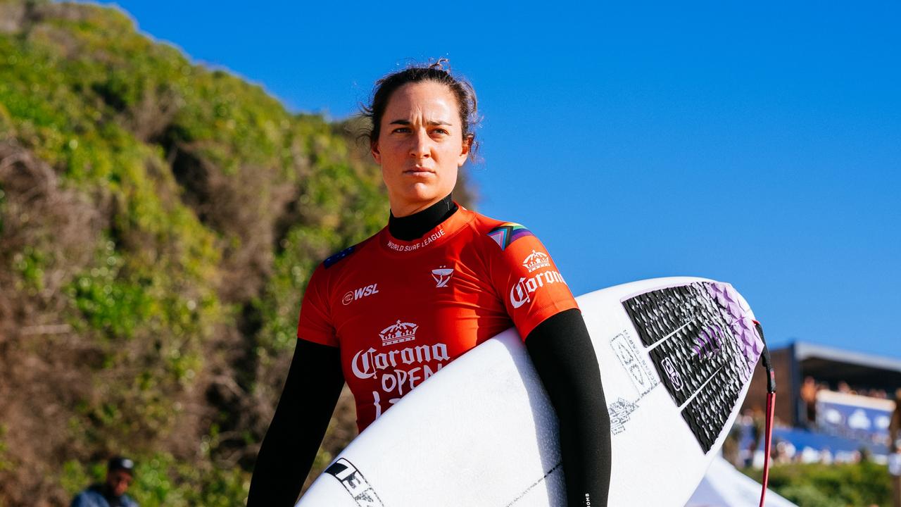 Tyler Wright wears a LQBTI flag on her shoulder. (Photo by Alan Van Gysen/World Surf League via Getty Images)