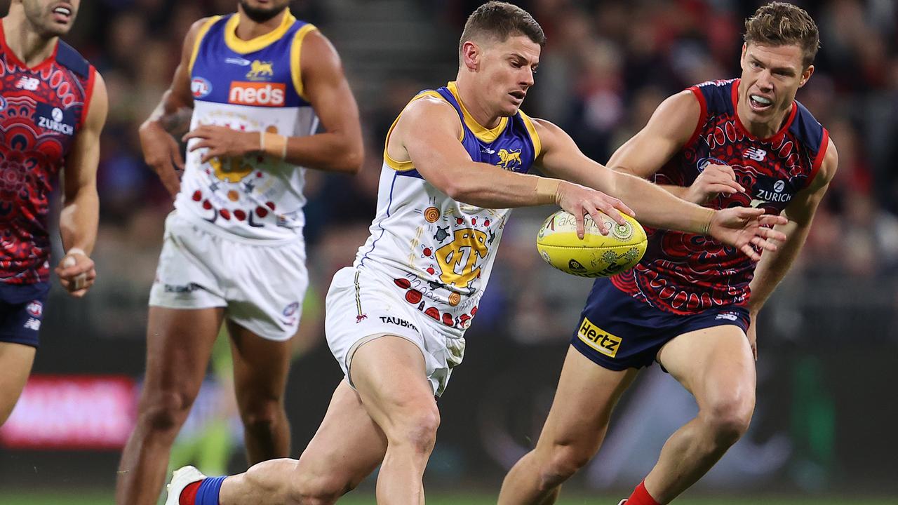 SYDNEY, AUSTRALIA - JUNE 04: Dayne Zorko of the Lions runs with the ball during the round 12 AFL match between the Melbourne Demons and the Brisbane Lions at GIANTS Stadium on June 04, 2021 in Sydney, Australia. (Photo by Mark Kolbe/Getty Images)