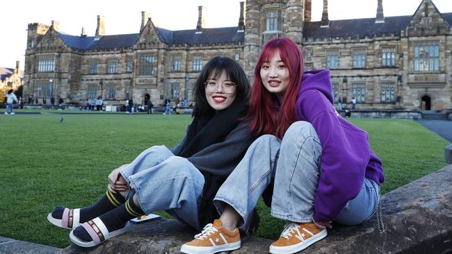 Chinese students Adrian Hanhui Zi, right and Cloris Jiang at the University of Sydney. Picture: John Feder