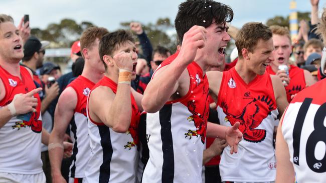 The Southern Football League Grand Final is being played between Noarlunga and Flagstaff Hill photograph at Hickinbotham Oval, Noarlunga Adelaide on Saturday the 21st of September 2019. FH celebrate after the win (AAP Image/Keryn Stevens)