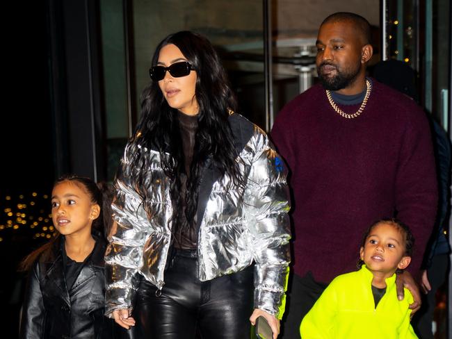 Kim Kardashian and Kanye West with two of their children, North West and Saint West, in 2019. Picture: Getty Images