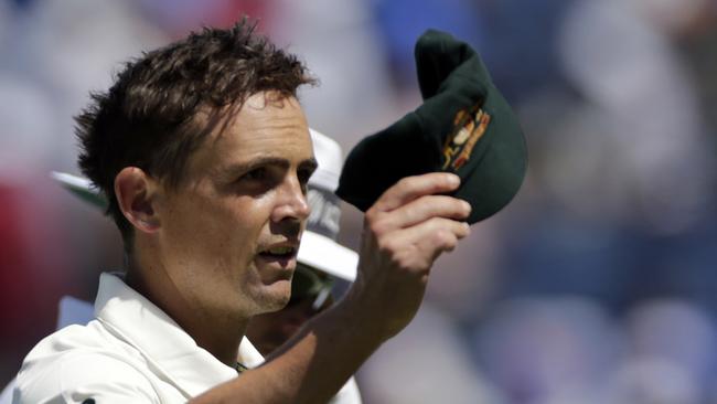 Australia's Steve O'Keefe acknowledges the crowd after taking six wickets on the second day of the first cricket test match against India in Pune, India.