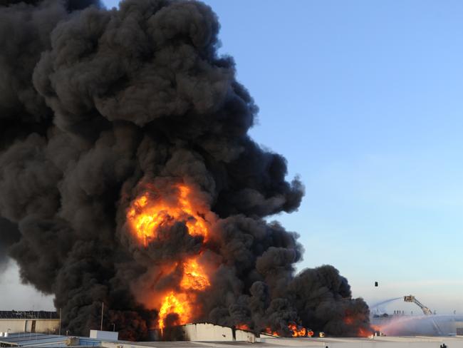 An out-of-control fire rages through factories in Campbellfield in 2019. Picture: Andrew Henshaw