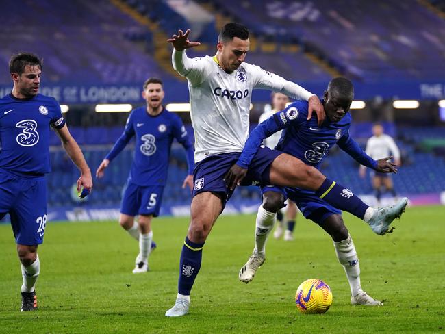 LONDON, ENGLAND - DECEMBER 28: Anwar El Ghazi of Aston Villa battles for possession with N'Golo Kante of Chelsea during the Premier League match between Chelsea and Aston Villa at Stamford Bridge on December 28, 2020 in London, England. The match will be played without fans, behind closed doors as a Covid-19 precaution. (Photo by John Walton - Pool/Getty Images)