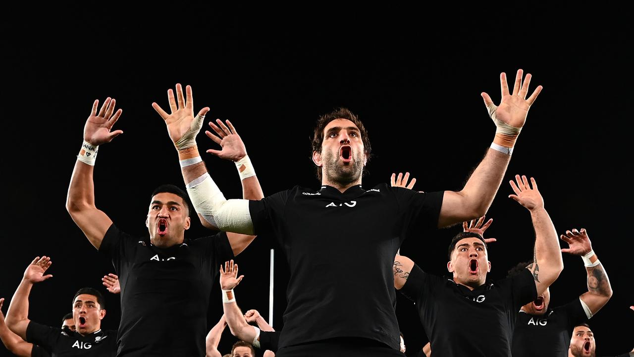 Rieko Ioane, Samuel Whitelock, Codie Taylor of the All Blacks perform the haka.