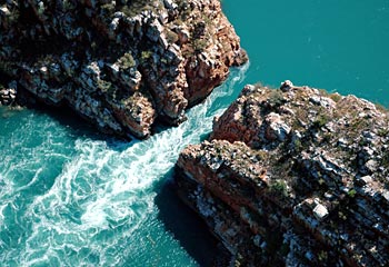 Wet and wild ... water trapped in basins behind narrow gaps creates whirlpools and eddies that can spin a small boat at the Horizontal Falls in Talbot Bay