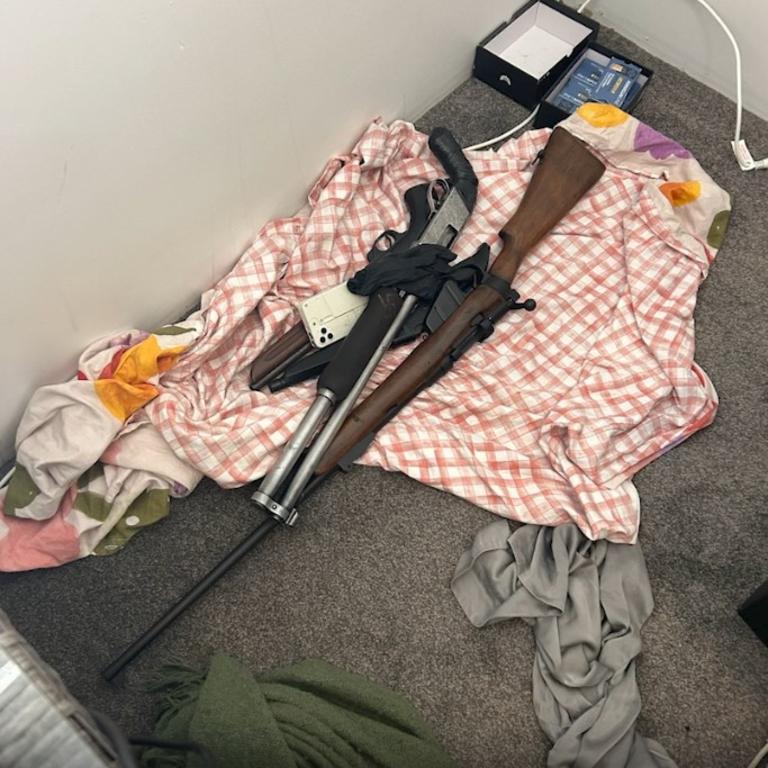Police allegedly seized drugs, cash, and weapons in the raids at Surfers Paradise and Biggera Waters. Picture: QPS