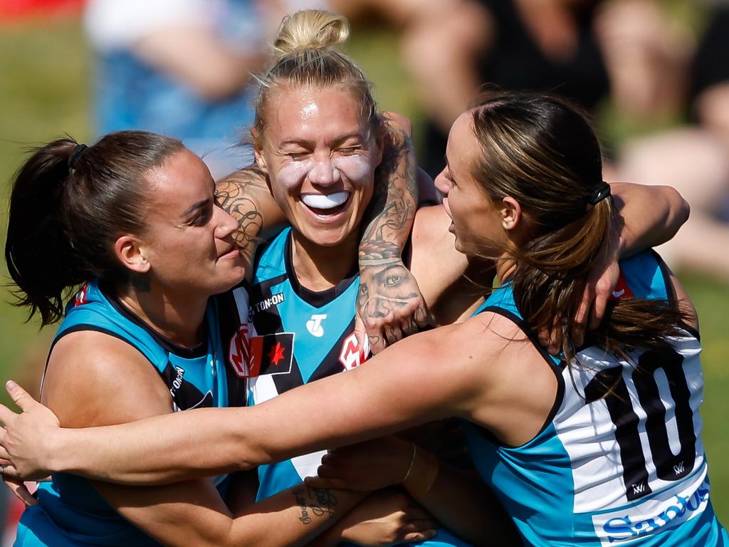 Erin Phillips celebrates a goal with teammates. Picture: Dylan Burns/AFL Photos via Getty Images