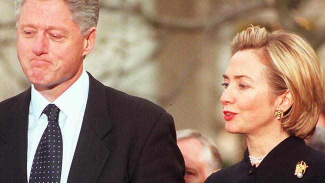 Bill and Hillary Clinton on the day the House of Representatives voted to impeach him.