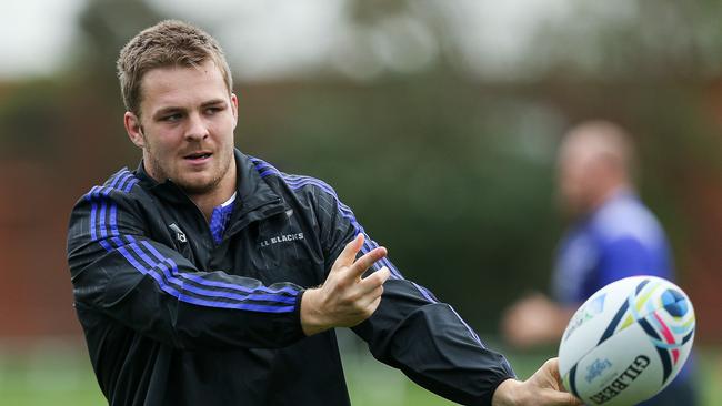 WELLINGTON, NEW ZEALAND - SEPTEMBER 02: Sam Cane passes during a New Zealand All Blacks training session at Hutt Recreation Ground on September 2, 2015 in Wellington, New Zealand. (Photo by Hagen Hopkins/Getty Images)