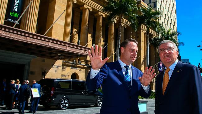 Brisbane Lord Mayor Adrian Schrinner (left) briefs International Olympic Committee (IOC) president Thomas Bach outside the City Hall after a press conference in Brisbane on May 6, 2019. Picture: Patrick Hamilton/AFP