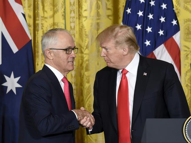 US President Donald Trump and Australian Prime Minister Malcolm Turnbull shake hands. Picture: AFP