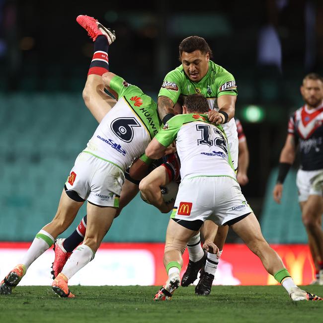 Brett Morris of the Roosters is dumped onto his head. Picture: Cameron Spencer/Getty Images