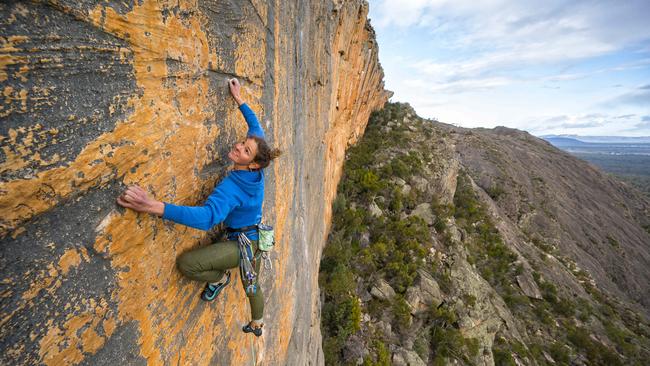 Rock climber Kerrin Gale scales the mighty Taipan Wall on the Dance of Life climb in 2019 in the Grampians, which is a permitted climb. Picture: Simon Carter