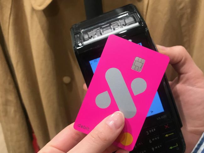 A customer using a neobank Xinja debit card. Picture: Supplied.