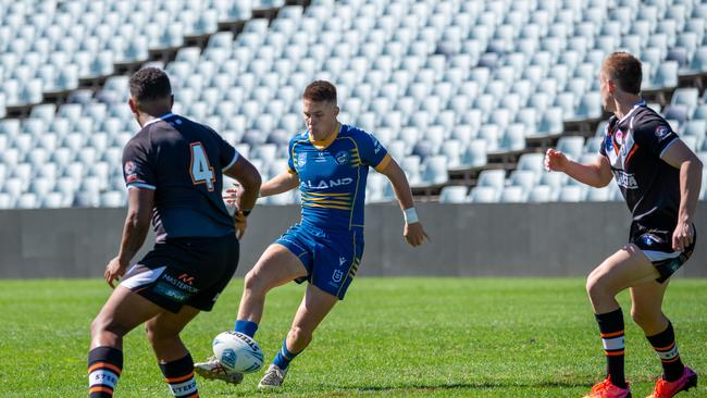 NSWRL Junior Final Rd 1 at Campbelltown – SG Ball – Parramatta Vs Wests Joshua Lynn kicks for the line. Picture Thomas Lisson