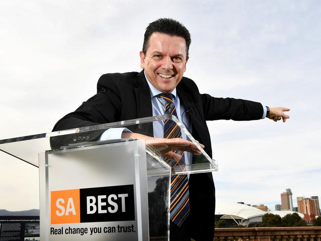 Nick Xenophon points the way for the SA Best party on Friday. He will be running for the state seat of Hartley.