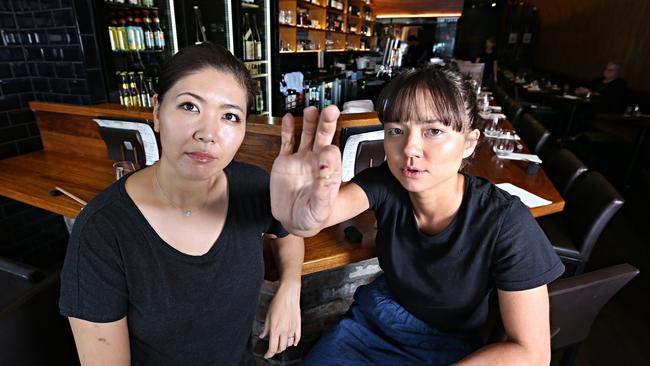 Emi Rakowski and Marie Yokoyama with the shard at the Birds Nest restaurant who were victims of the glass in the meal scam.