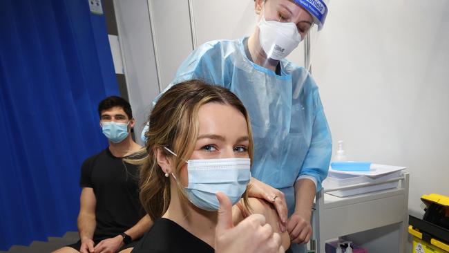 Young couple Claire Edler and Jacob Mahony received the AstraZeneca vaccine together. Picture: David Caird