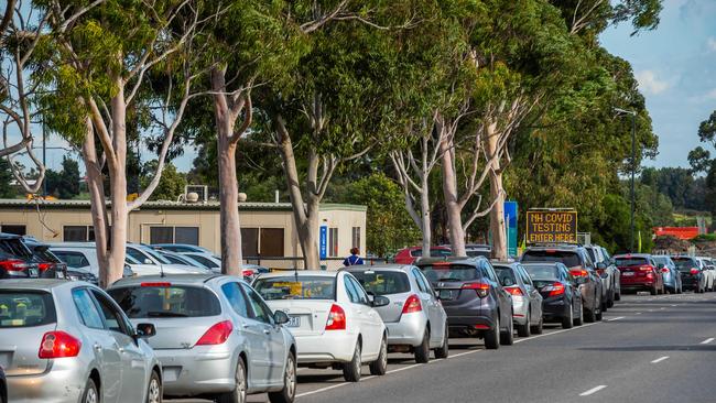 Massive queues have formed outside Northern Health’s Epping testing site. Picture: Jake Nowakowski