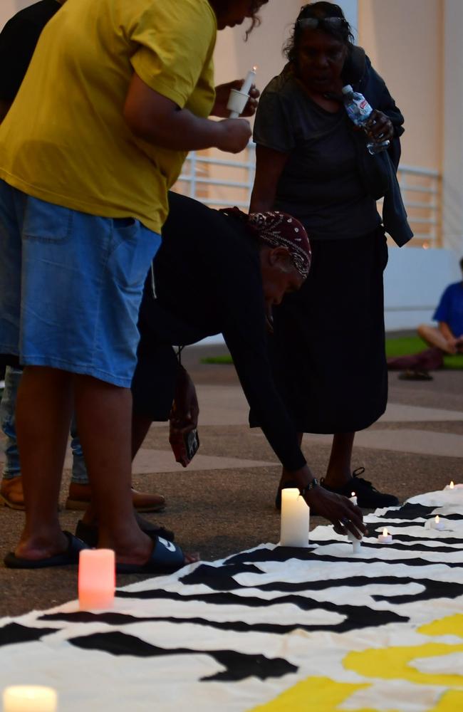 Warlpiri community leaders stood outside the NT Parliament on Wednesday during a vigil for Kumanjayi White, a 24-year-old Yuendumu man with a disability who died after being restrained by police in the Alice Springs Coles. Picture: Zizi Averill
