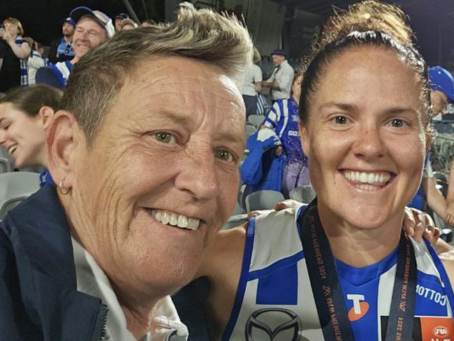 Sal Rees with North Melbourne Premiership Captain Emma Kearney.