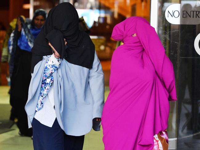 Supporters of Zainab Abdirahman-Khalif leave the Supreme Court on Monday after she was found guilty. Picture: AAP / David Mariuz