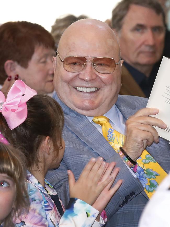 Bert Newton applauds his wife Patti Newton after she received an AM for significant service to the broadcast media as an entertainer and presenter, and as a supporter of charitable and medical research foundations. Picture: David Caird